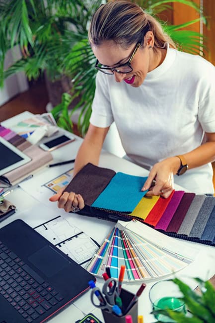 women choosing fabric